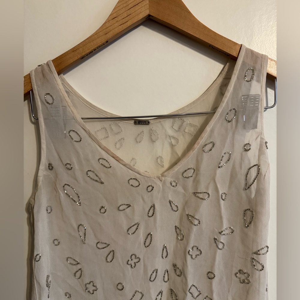 Used sequence shirt. Super pretty on!